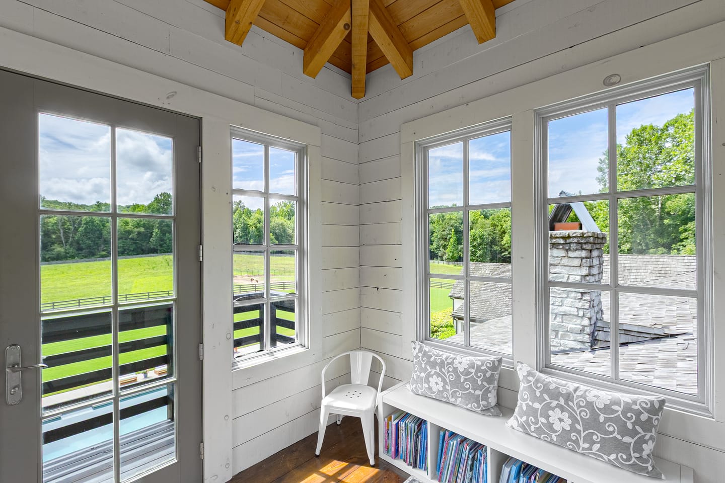Lookout room window seat with views over the fenced pasture